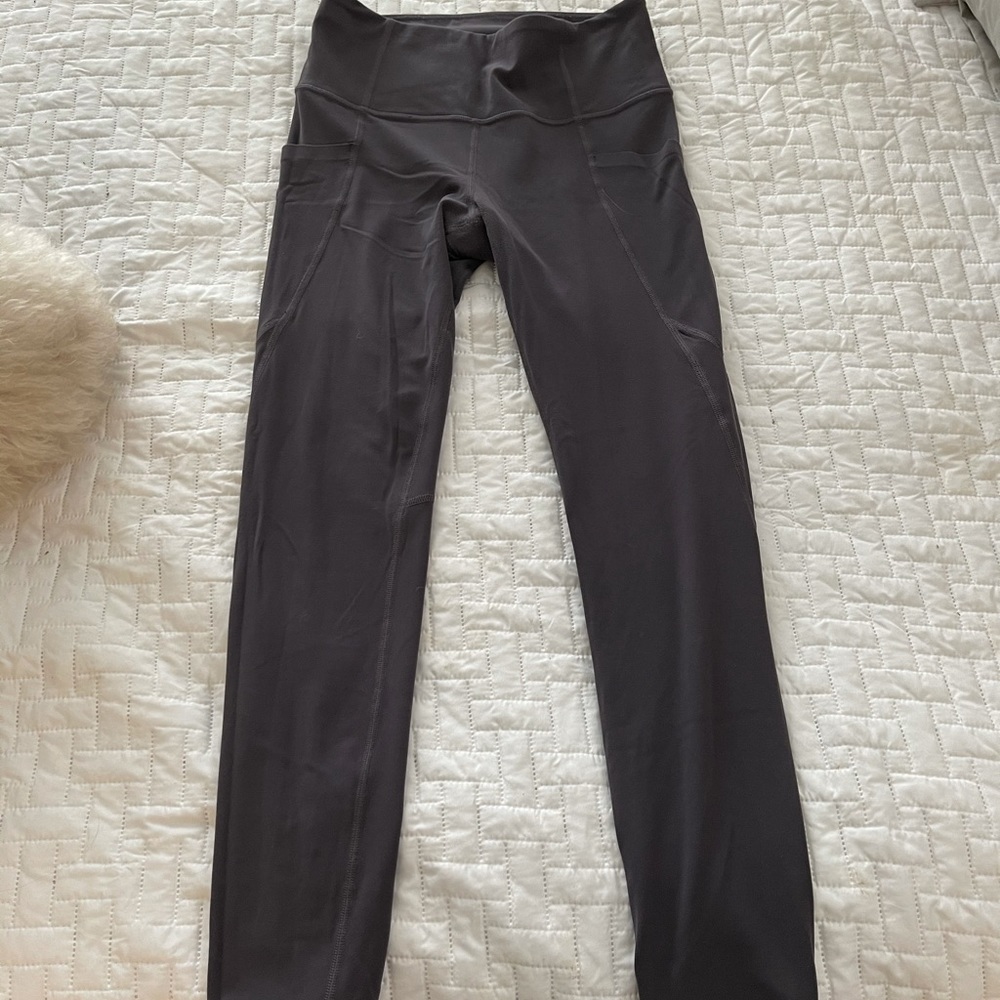 Athlete stash pocket salutation tight 7/8 length